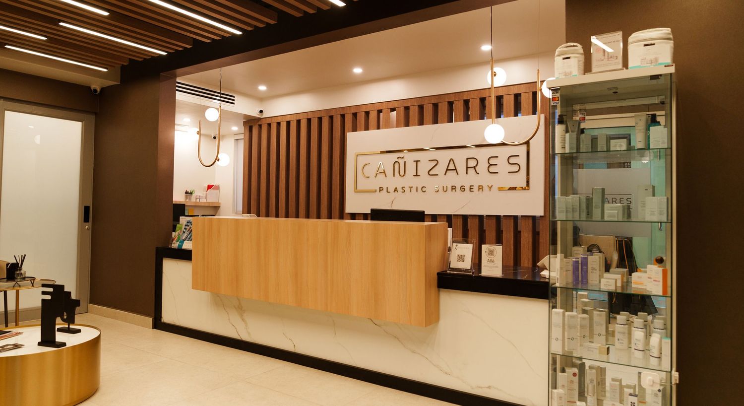 Modern plastic surgery clinic reception area.