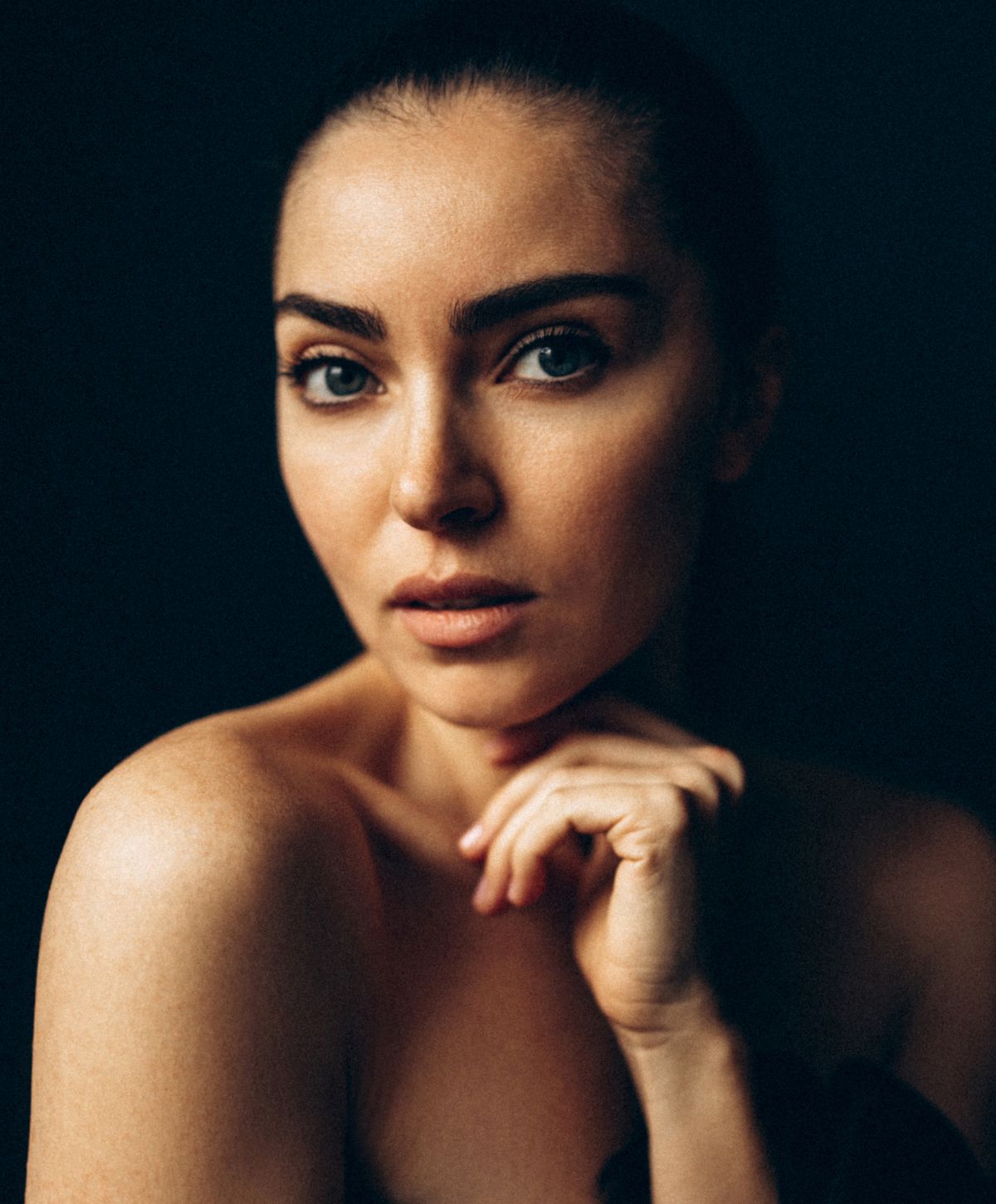 Portrait of a woman with stylish hairstyle.