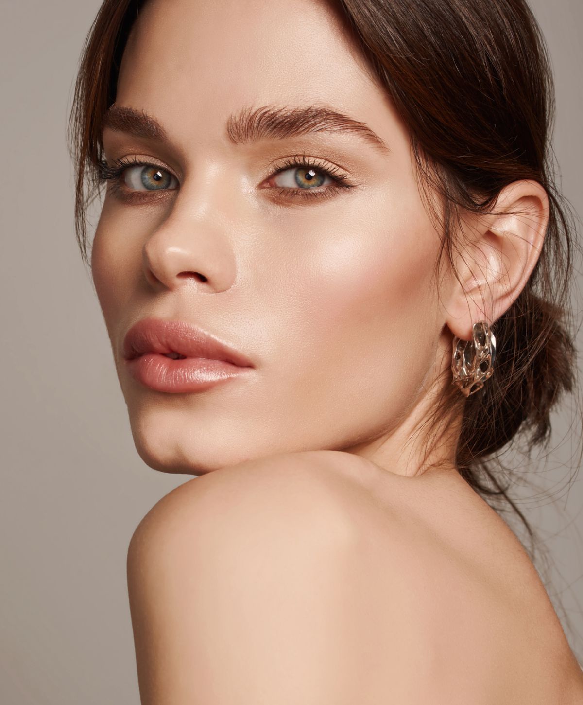 Close-up of a woman with natural makeup.