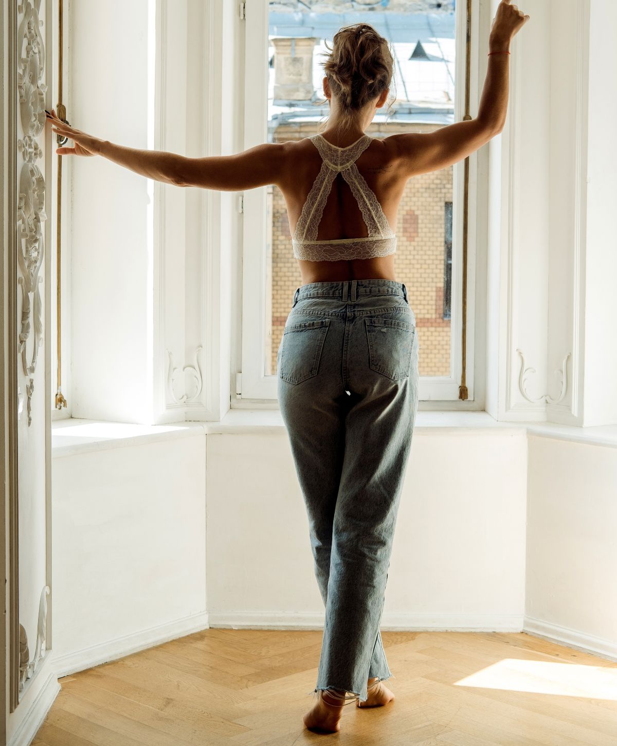 Woman with shoulder-length hair and striking features.